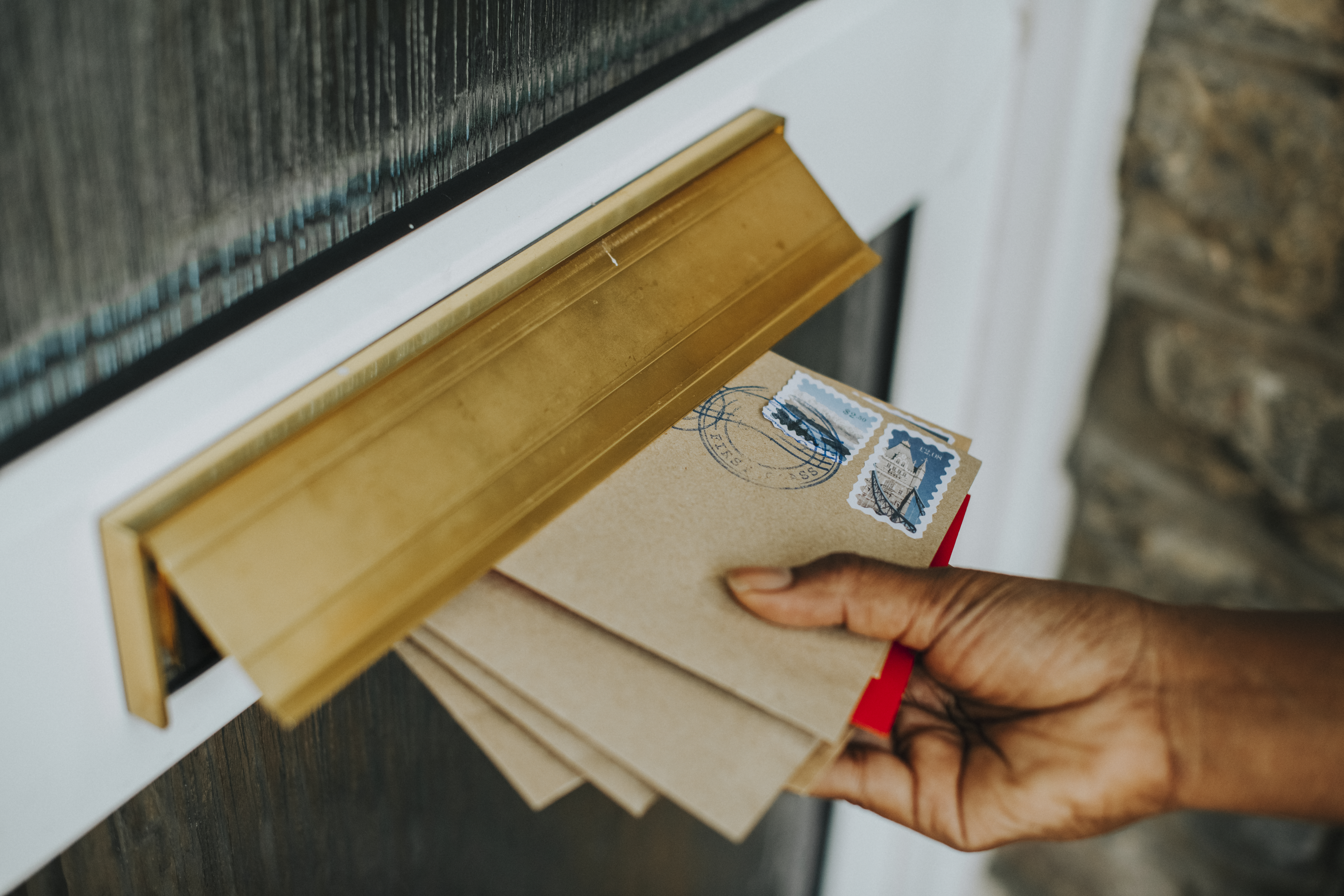 Delivering direct mail envelopes  through the front door mail slot